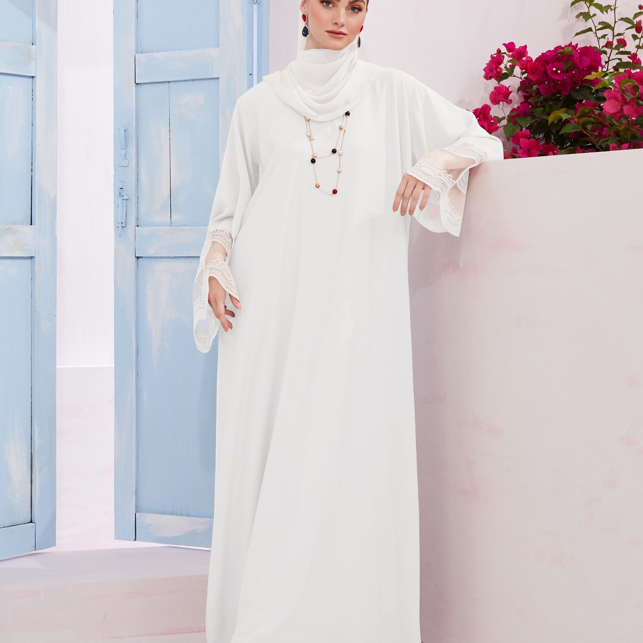 Catherine Abaya in Off White