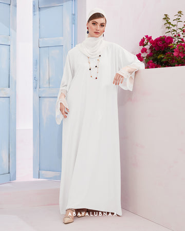 Catherine Abaya in Off White