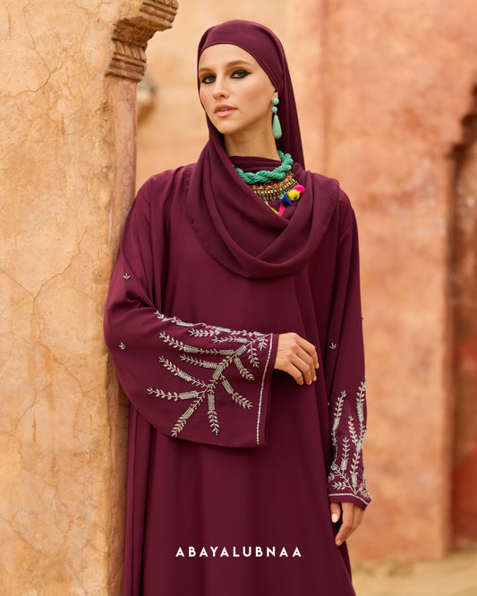 Nora Abaya in Maroon