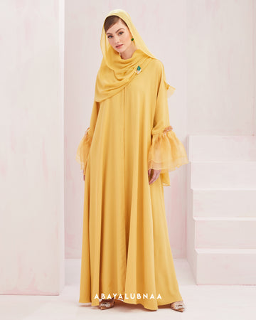 Khloe Abaya in Yellow Mustard